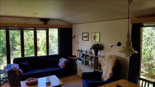 Vanaf € 320,-. Texel - Luxe Chalet (2 volwassenen, 2 kinderen) op schitterende locatie vlak bij bos en strand - "Ta Lème"